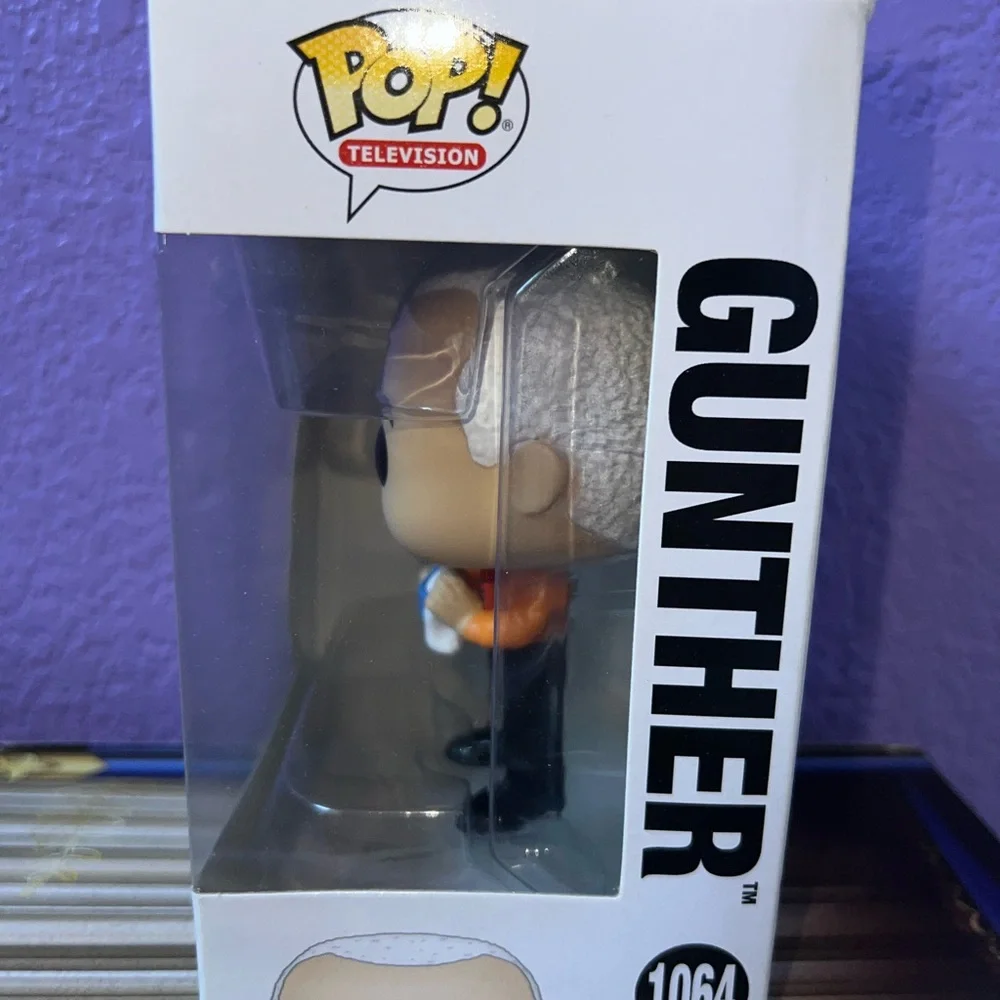 Funko Pop! Gunther from Friends Figure with Orange and Black Outfit